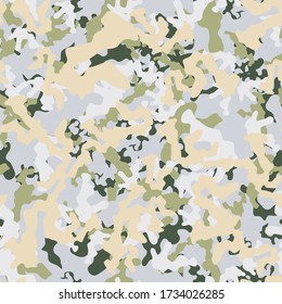 Urban camouflage of various shades of beige, white and green colors. It is a colorful seamless pattern that can be used as a camo print for clothing and background and backdrop or computer wallpaper