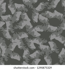 Urban camouflage of various shades of grey and green colors. It is a colorful seamless pattern that can be used as a camo print for clothing and background and backdrop or computer wallpaper
