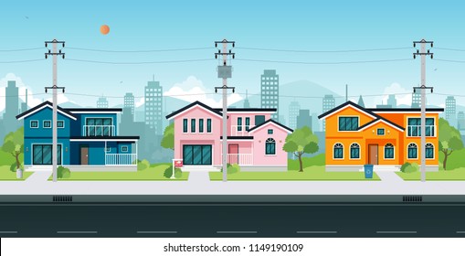 Urban houses with electric poles and cable on the street.