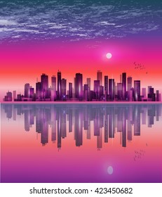 Urban night city skyline in moonlight or sunset, with reflection in water and cloudy sky