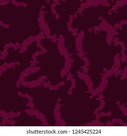 Urban UFO camouflage of various shades of red and dark pink colors. It is a colorful seamless pattern that can be used as a camo print for clothing and background and backdrop or computer wallpaper