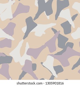 Urban UFO camouflage of various shades of beige, blue, purple and white colors. It is a colorful seamless pattern that can be used as a camo print for clothing and background and backdrop or wallpaper
