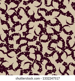Urban UFO camouflage of various shades of beige and red colors. It is a colorful seamless pattern that can be used as a camo print for clothing and background and backdrop or computer wallpaper