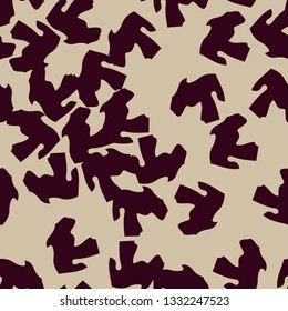 Urban UFO camouflage of various shades of beige and red colors. It is a colorful seamless pattern that can be used as a camo print for clothing and background and backdrop or computer wallpaper