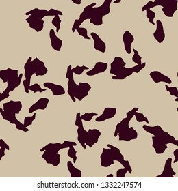 Urban UFO camouflage of various shades of beige and red colors. It is a colorful seamless pattern that can be used as a camo print for clothing and background and backdrop or computer wallpaper