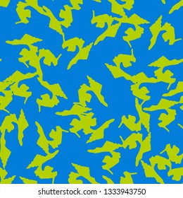 Urban UFO camouflage of various shades of blue and green colors. It is a colorful seamless pattern that can be used as a camo print for clothing and background and backdrop or computer wallpaper