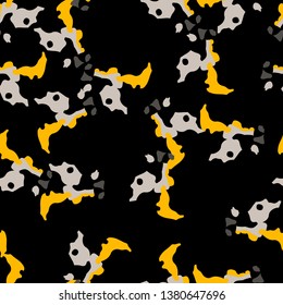 Urban UFO camouflage of various shades of grey, black and yellow colors. It is a colorful seamless pattern that can be used as a camo print for clothing and background and backdrop or wallpaper
