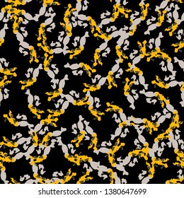 Urban UFO camouflage of various shades of grey, black and yellow colors. It is a colorful seamless pattern that can be used as a camo print for clothing and background and backdrop or wallpaper