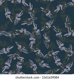 Urban UFO camouflage of various shades of blue, green and violet colors. It is a colorful seamless pattern that can be used as a camo print for clothing and background and backdrop or wallpaper