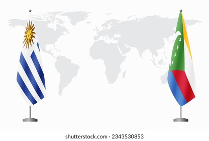 Uruguay and Comoros flags for official meeting against background of world map.