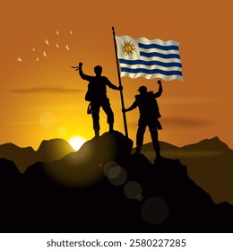 Uruguay flag, silhouette of two climbers holding flags at sunset