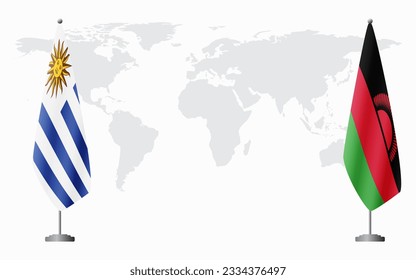 Uruguay and Malawi flags for official meeting against background of world map.