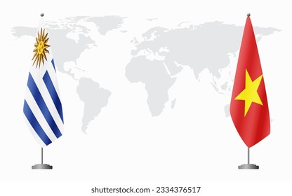 Uruguay and Vietnam flags for official meeting against background of world map.