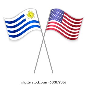 Uruguayan and American crossed flags. Uruguay combined with United States of America isolated on white. Language learning, international business or travel concept.