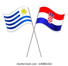 Uruguayan and Croatian crossed flags. Uruguay combined with Croatia isolated on white. Language learning, international business or travel concept.