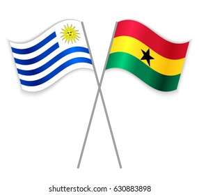 Uruguayan and Ghanaian crossed flags. Uruguay combined with Ghana isolated on white. Language learning, international business or travel concept.