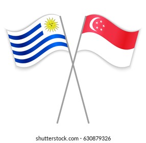 Uruguayan and Singaporean crossed flags. Uruguay combined with Singapore isolated on white. Language learning, international business or travel concept.