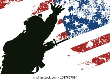 US soldier with the American Flag on the background