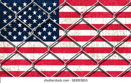 USA Flag behind steel wire fence.