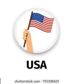 USA flag in hand, round icon with shadow isolated on white. Human hand holding flag, vector illustration