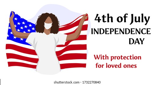 USA Independence Day. 4th of July. A woman in a medical mask holds the flag of America in her hands. The concept of patreotism, the greatness of the country, protection against coronovirus.