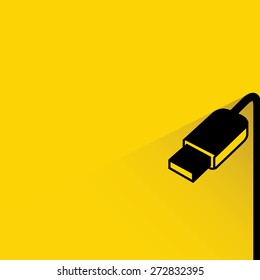 usb plug on yellow background, flat and shadow theme