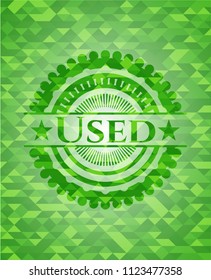 Used green emblem with triangle mosaic background