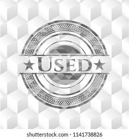 Used grey badge with geometric cube white background