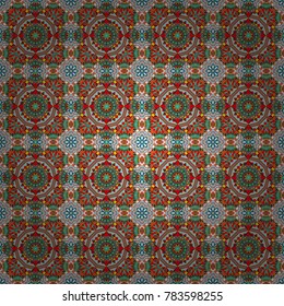 Useful as design element for texture and artistic compositions. Vector illustration. Mandalas kaleidoscope seamless pattern. Composed of orange, pink and blue abstract elements.