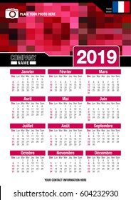 Useful wall calendar 2019 with design of red colors mosaic. Format A4 vertical. Size: 210mm x 297mm. French version - Vector image