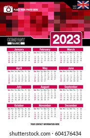 Useful wall calendar 2023 with design of red colors mosaic. Format A4 vertical. Size: 210mm x 297mm. English version - Vector image