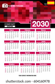 Useful wall calendar 2030 with design of red colors mosaic. Format A4 vertical. Size: 210mm x 297mm. Spanish version - Vector image