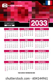 Useful wall calendar 2033 with design of red colors mosaic. Format A4 vertical. Size: 210mm x 297mm. French version - Vector image