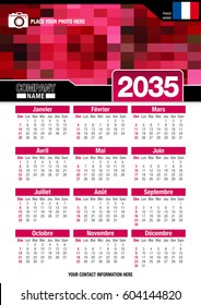 Useful wall calendar 2035 with design of red colors mosaic. Format A4 vertical. Size: 210mm x 297mm. French version - Vector image