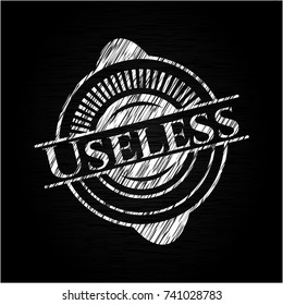 Useless chalkboard emblem written on a blackboard