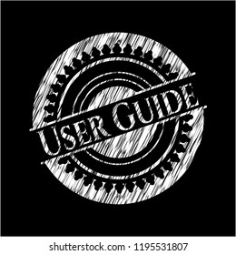 User Guide chalk emblem written on a blackboard