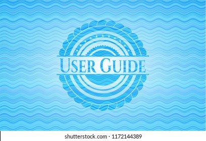 User Guide light blue water style emblem.