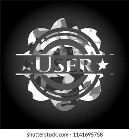 User on grey camouflage texture