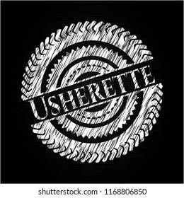 Usherette chalkboard emblem written on a blackboard