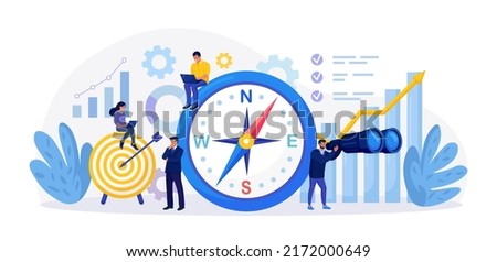 Using Compass for Navigation and Orientation in Business. Strategic Planning, Future Vision. Business Strategy Direction. Mission concept. Businessman Makes Important Decisions, Sets Goals for Company ストックフォト © 