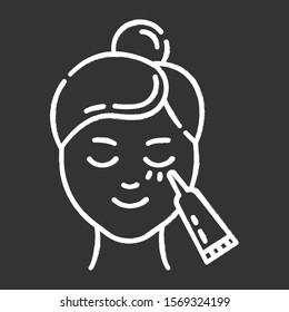 Using undereye cream chalk icon. Skin care procedure. Facial beauty treatment. Lifting and exfoliating effect. Eye makeup product. Dermatology, cosmetics. Isolated vector chalkboard illustration
