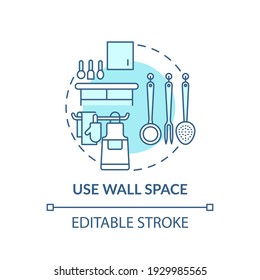 Using wall space concept icon. Crockery hooks and cookware on wall idea thin line illustration. Freeing up storage in cupboards. Vector isolated outline RGB color drawing. Editable stroke