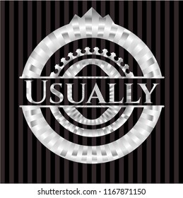 Usually silvery badge