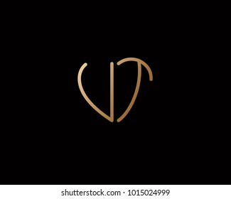UT initial heart shape gold colored logo