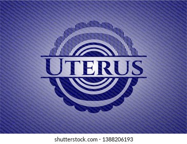 Uterus emblem with jean background. Vector Illustration. Detailed.