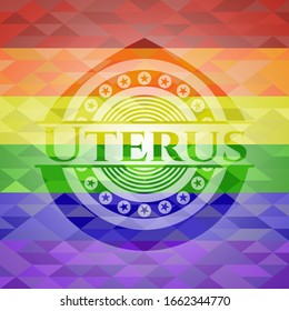Uterus emblem on mosaic background with the colors of the LGBT flag