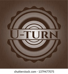 U-turn badge with wooden background