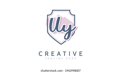 Iniciales UY, vector de logotipo de escritura a mano