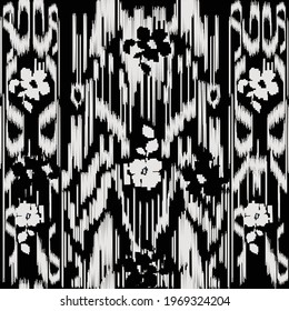 Uzbek ikat pattern fabric- crepe de chine. Black and white fabric. Traditional textile product in Uzbekistan. Silk