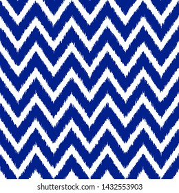 Uzbek ikat silk fabric pattern, indigo blue and white colors. Seamless geometric pattern, based on ikkat fabric style. Vector illustration. Carpet rug texture vector imitation.